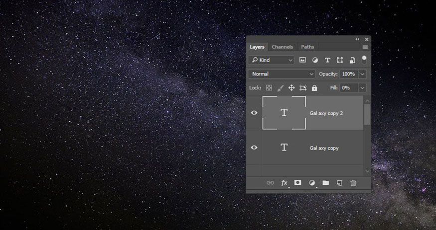 Nhấn tổ hợp Ctrl+J 2 lần để nhân đôi layer văn bản hai lần.